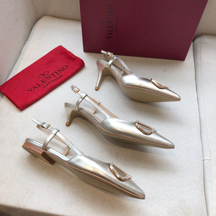 VLOGO SIGNATURE SILVER PATENT LEATHER SLINGBACK PUMP
