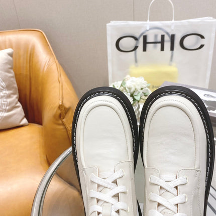 BOTTEGA VENETA 26S ZIP-UP PLATFORM ANKLE BOOTS IN OFF WHITE CALFSKIN