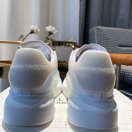 OVERSIZED SNEAKERS IN WHITE CALFSKIN WITH RUBBER HEEL TAB