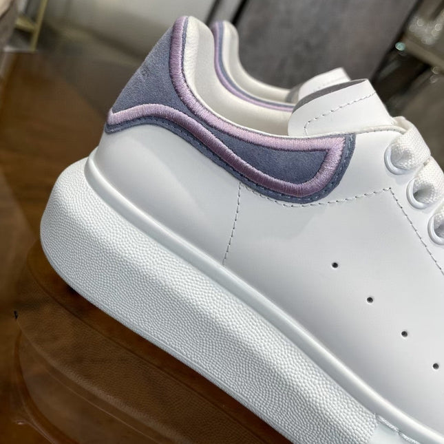 OVERSIZED SNEAKER IN WHITE CALFSKIN WITH PURPLE SUEDE HEEL TAB