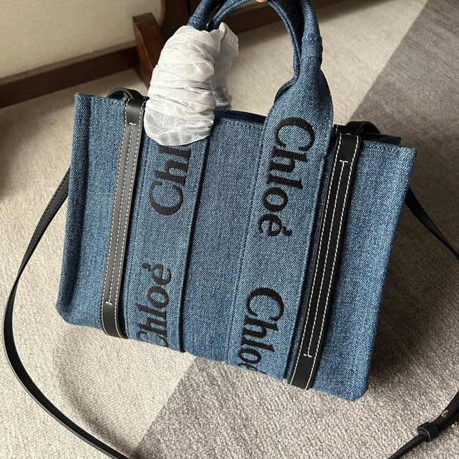 SMALL WOODY TOTE BAG 26.5 IN BLUE DENIM BLACK CALFSKIN