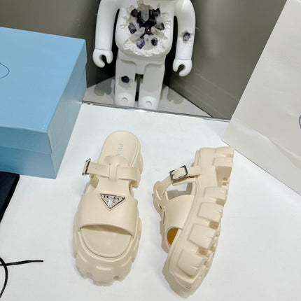 MONOLITH SLIPPER SANDALS IN BEIGE RUBBER