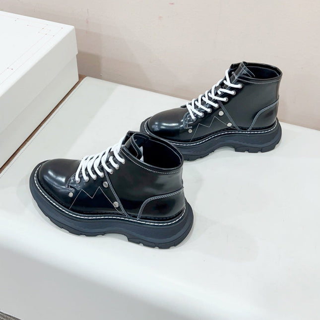 MCQUEEN LEATHER ANKLE BOOT IN BLACK MIX WHITE LAMBSKIN