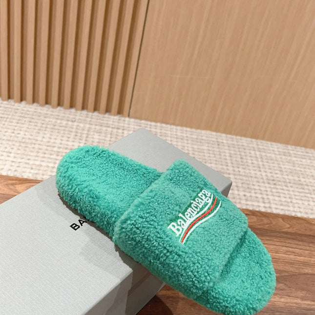 FURRY SLIDES IN TURQUOISE CURLY SHEARLING