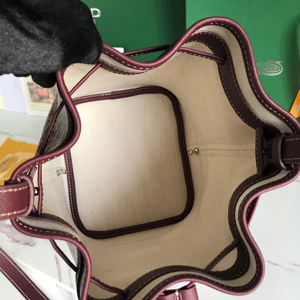 PETIT FLOT BUCKET BAG 22 IN WINE RED GOYARDINE CANVAS AND LAMBSKIN TRIM
