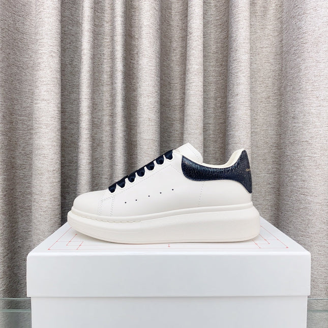 OVERSIZED SNEAKERS IN WHITE CALFSKIN WITH BLACK HEEL TAB
