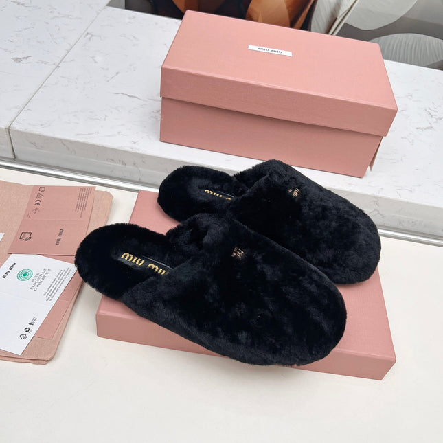 MIUMIU 26S MULES IN BLACK SHEARLING