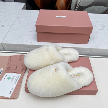 MIUMIU 26S MULES IN CREAM WHITE SHEARLING