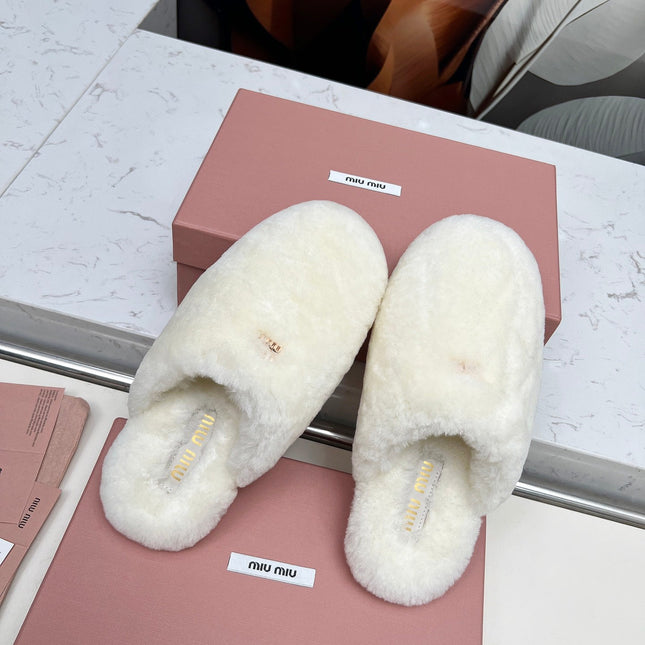 MIUMIU 26S MULES IN CREAM WHITE SHEARLING