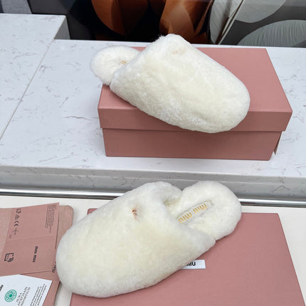 MIUMIU 26S MULES IN CREAM WHITE SHEARLING