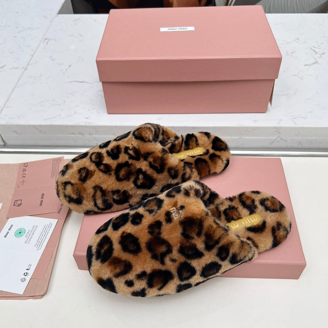 MIUMIU 26S MULES IN LEOPARD PATTERN SHEARLING 