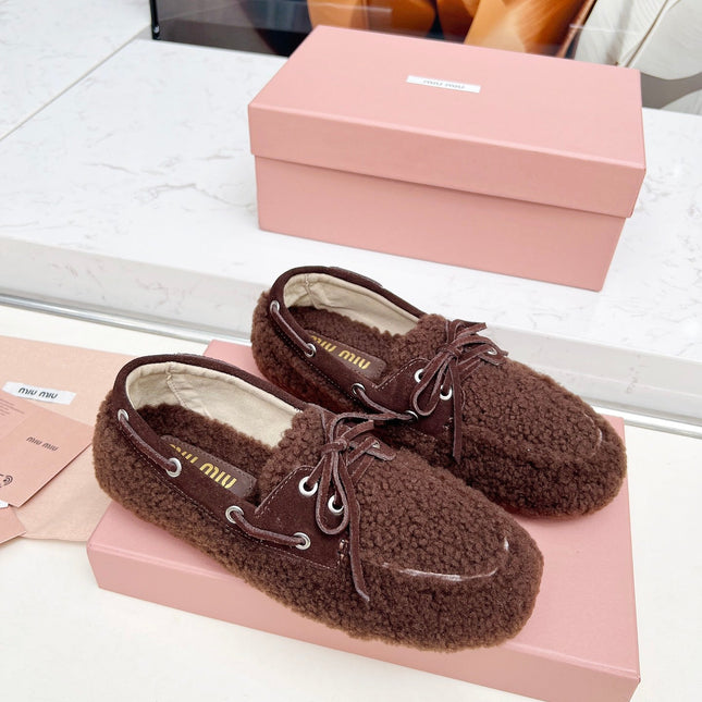 MIUMIU 26S BOAT LOAFERS IN DARK BROWN SHEARLING