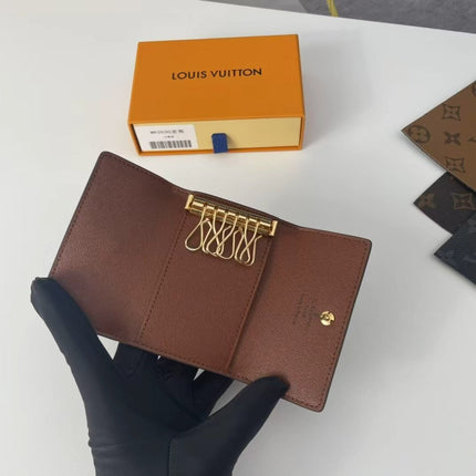 26S HOLDER IN BROWN CANVAS EMBOSSED LOGO