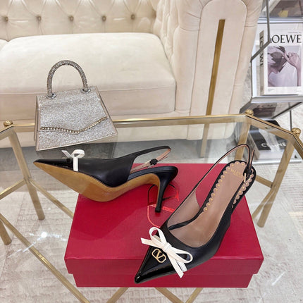 GARAVANI POINTED SLINGBACK PUMPS IN BLACK CALFSKIN