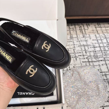 SLINGBACK LOAFER IN BLACK CALFSKIN AND SHEARLING