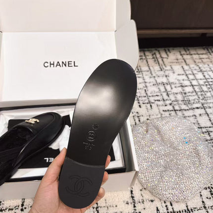 SLINGBACK LOAFER IN BLACK CALFSKIN AND SHEARLING