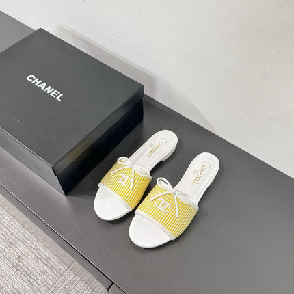 CC STRIPED SLIDE SANDALS IN YELLOW AND WHITE CANVAS