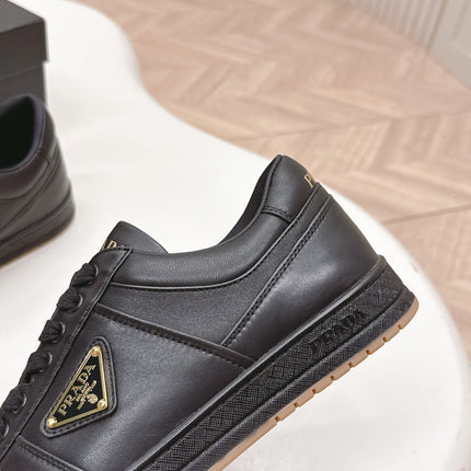PRADA 25S DOWNTOWN SNEAKERS IN BLACK CALFSKIN