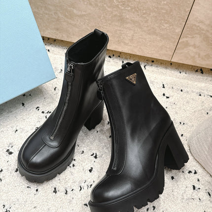 PRADA 26S FRONT ZIP CHUNKY HEEL ANKLE BOOTS 70MM IN BLACK CALFSKIN