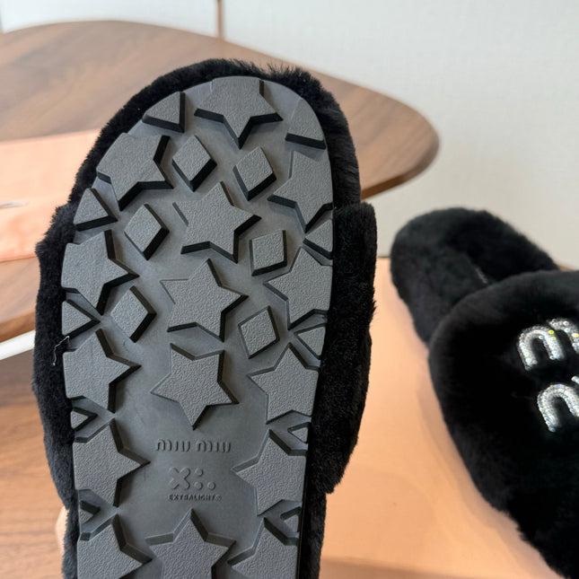 MIUMIU 26S CRYSTAL LOGO SLIDES IN BLACK SHEARLING