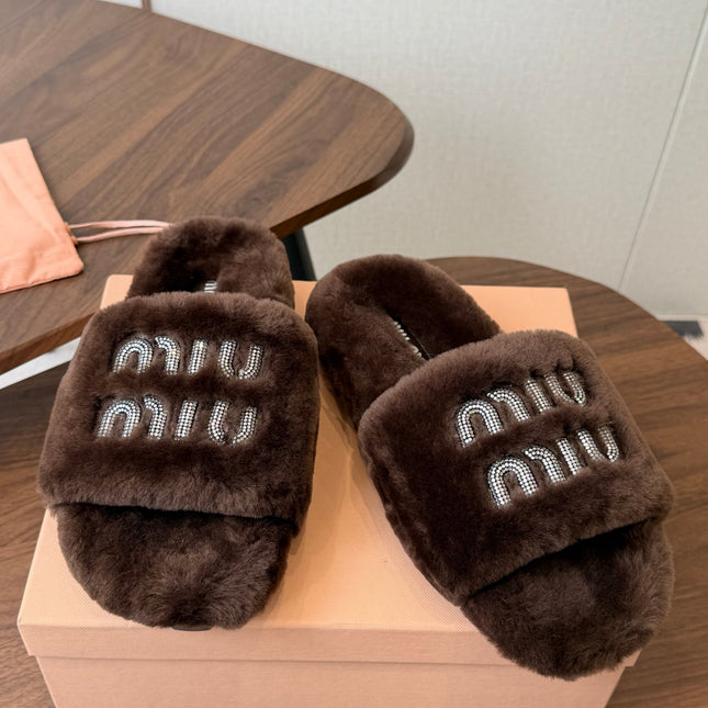 MIUMIU 26S CRYSTAL LOGO SLIDES IN DARK BROWN SHEARLING