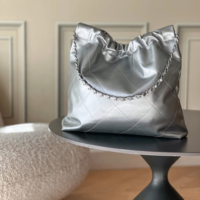 CHANEL 26S 22 BAG 42 IN METALLIC SILVER QUILTED SHINY CALFSKIN