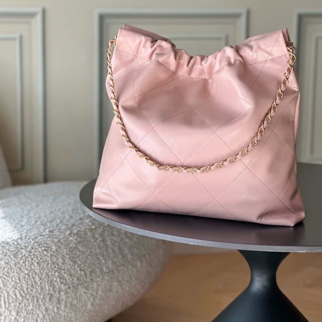 CHANEL 26S 22 BAG 42 IN PASTEL PINK QUILTED SHINY CALFSKIN