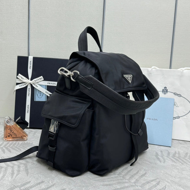 PRADA 25S EXPLORE BACKPACK 39 IN BLACK RE-NYLON AND CALFSKIN