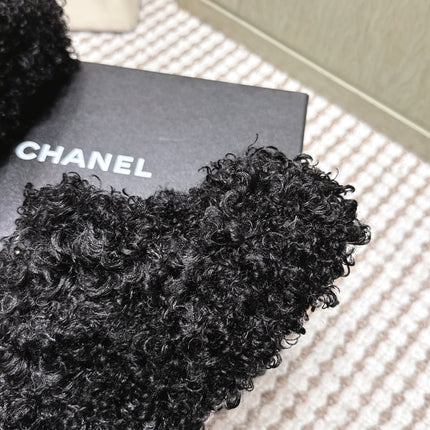CHANEL 25S CLASSIC FURRY SLIDES IN BLACK WITH DOUBLE C LOGO