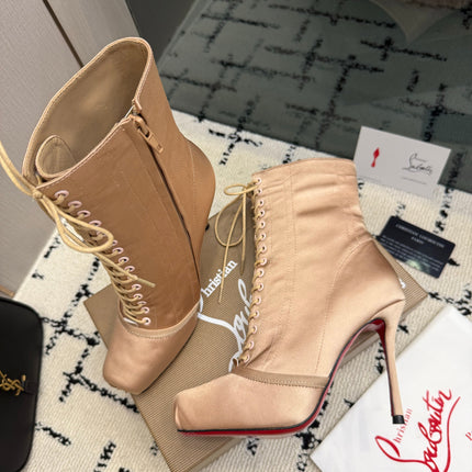 CHRISTIAN LOUBOUTIN 26S LACE-UP HEEL BOOTS 100 MM IN BEIGE SATIN