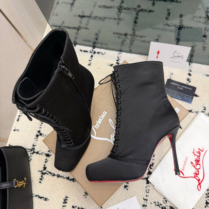 CHRISTIAN LOUBOUTIN 26S LACE-UP HEEL BOOTS 100 MM IN BLACK SATIN