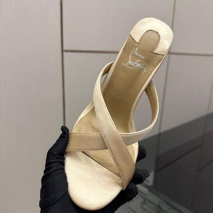 CHRISTIAN LOUBOUTIN 26S CROSS-STRAP HIGH HEEL SANDALS 105 MM IN BEIGE SATIN