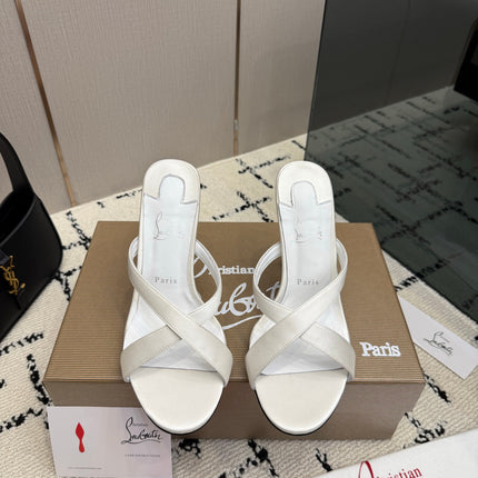 CHRISTIAN LOUBOUTIN 26S CROSS-STRAP HIGH HEEL SANDALS 105 MM IN CREAM WHITE SATIN