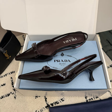 PRADA 26S BUCKLE STRAP SLINGBACK PUMPS IN BURGUNDY RED PATENT CALFSKIN WITH BOW