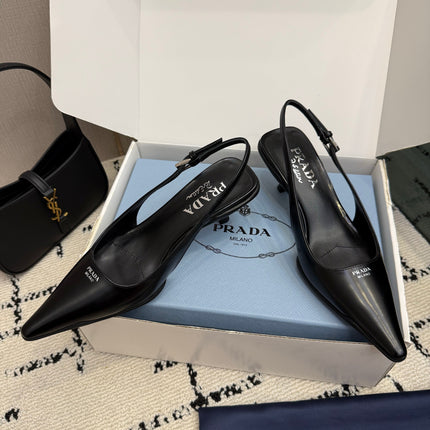 PRADA 26S BUCKLE STRAP SLINGBACK PUMPS IN BLACK CALFSKIN