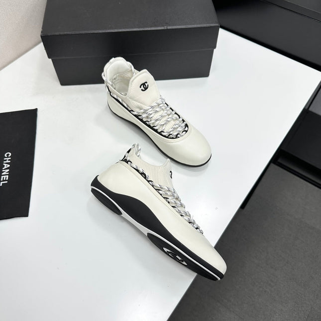 CHANEL 26S SNEAKERS IN WHITE AND BLACK CALFSKIN