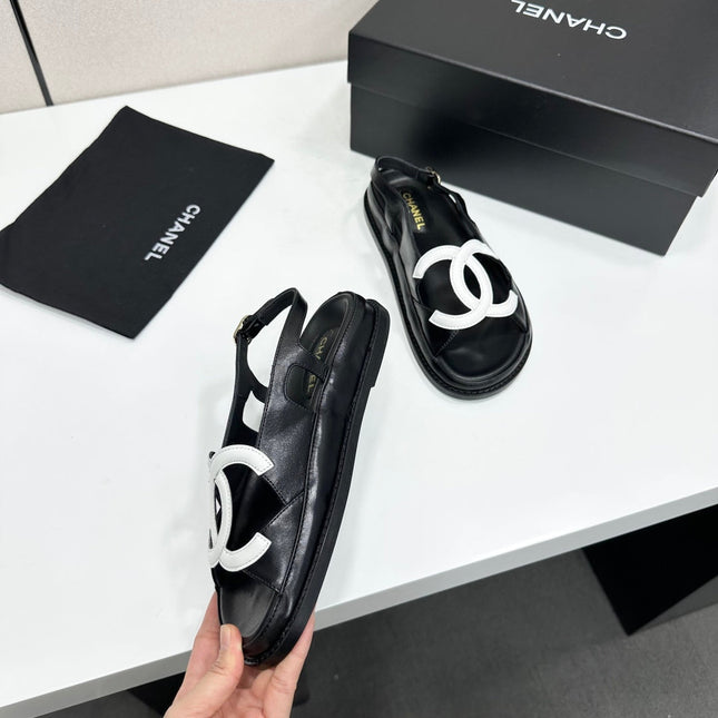 CHANEL 26S FLAT SANDALS IN BLACK LAMBSKIN WITH WHITE OVERSIZED CC LOGO