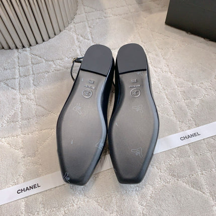 CHANEL 25S CAMELLIA SQUARE TOE FLATS IN BLACK CALFSKIN GOLD HARDWARE