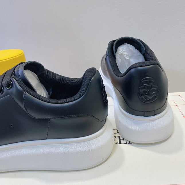 OVERSIZED SNEAKERS IN BLACK SMOOTH CALFSKIN WITH BLACK HEEL DETAIL