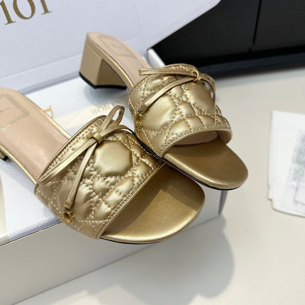 DIOR 26S BLOCK HEEL SLIDE SANDALS IN GOLD QUILTED CALFSKIN WITH BOW