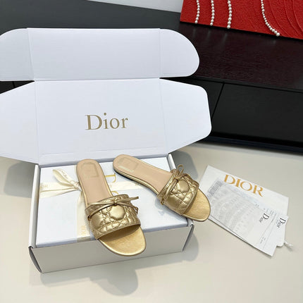 DIOR 26S SLIDE SANDALS IN GOLD QUILTED CALFSKIN WITH BOW