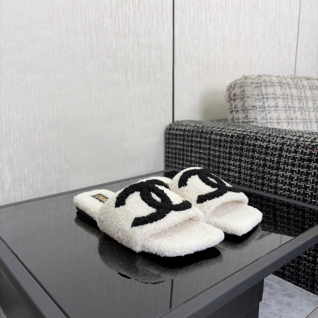 CHANEL 26S SLIDE SANDALS IN BLACK AND WHITE SHEARLING SQUARE TOE