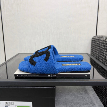 CHANEL 26S SLIDE SANDALS IN BLACK AND BLUE SHEARLING SQUARE TOE