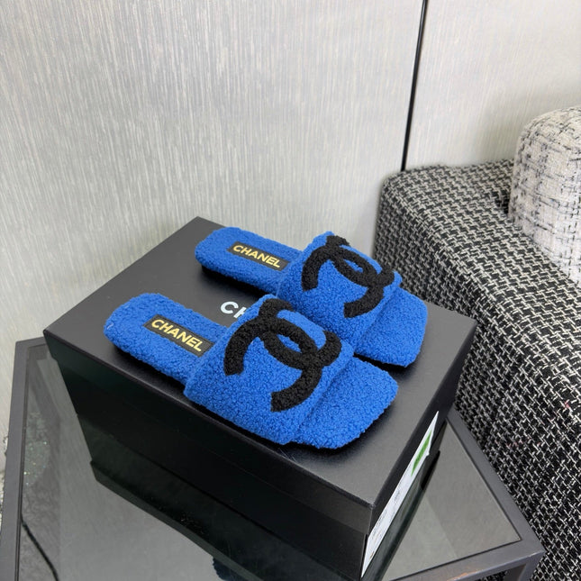 CHANEL 26S SLIDE SANDALS IN BLACK AND BLUE SHEARLING SQUARE TOE