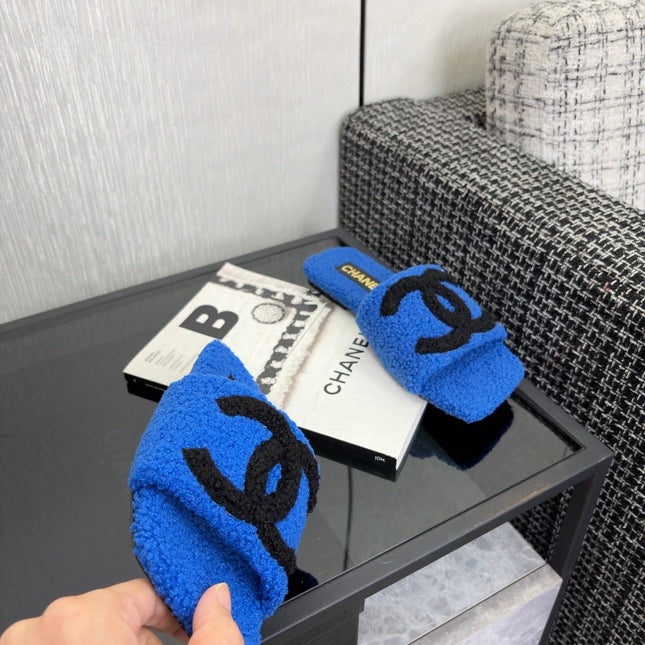CHANEL 26S SLIDE SANDALS IN BLACK AND BLUE SHEARLING SQUARE TOE