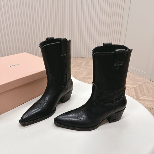 POINTED TOE BOOTS IN BLACK CALFSKIN