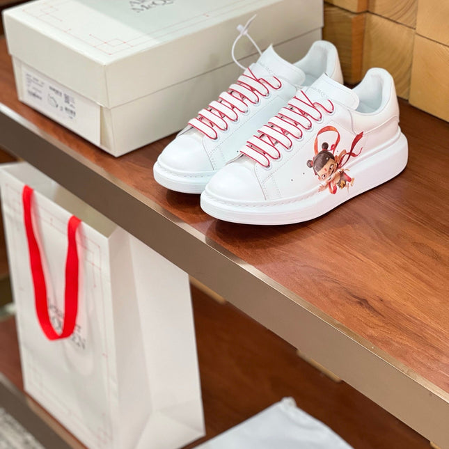 OVERSIZED SNEAKERS IN WHITE CALFSKIN WITH CARTOON FIGURE