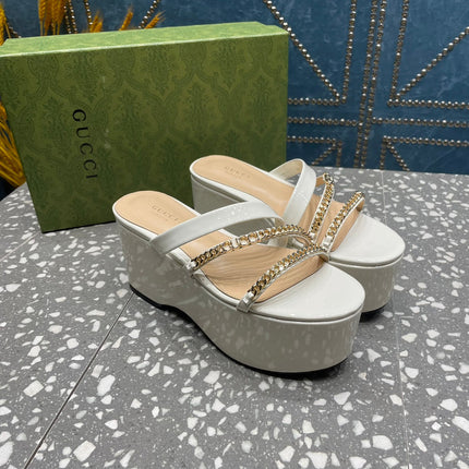 HIGH WEDGE PLATFORM IN WHITE CALFSKIN WITH GOLD HARDWARE