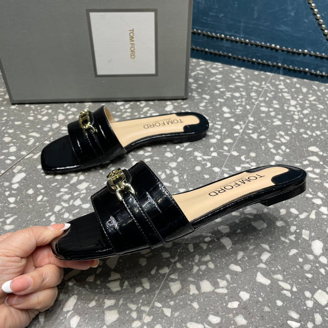 FLAT MULE IN BLACK CALFSKIN