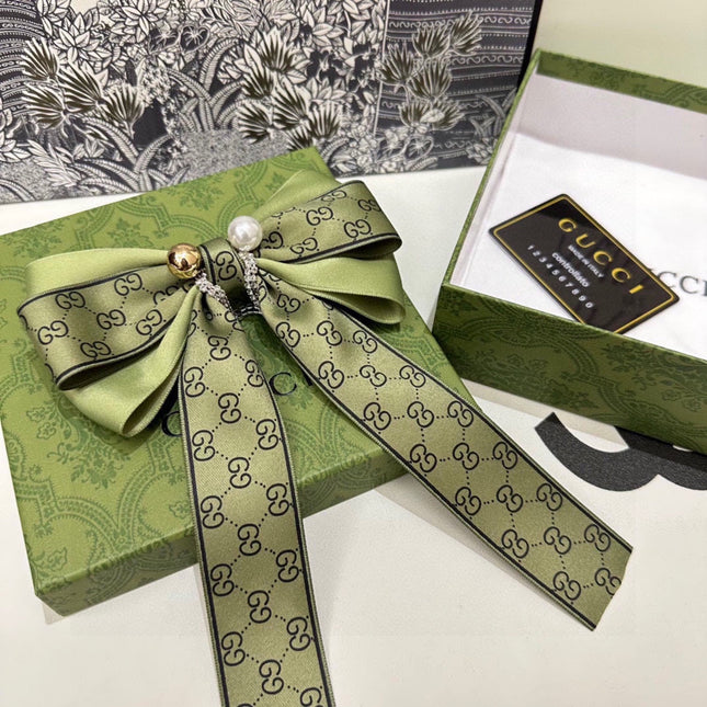 RIBBON BOW HAIR CLIP IN OLIVE GREEN RE-NYLON ATTACHED PEARL 358261